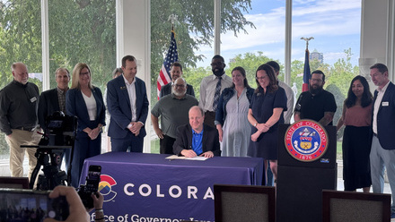 Polis signing SB-145 May 2026.jpg